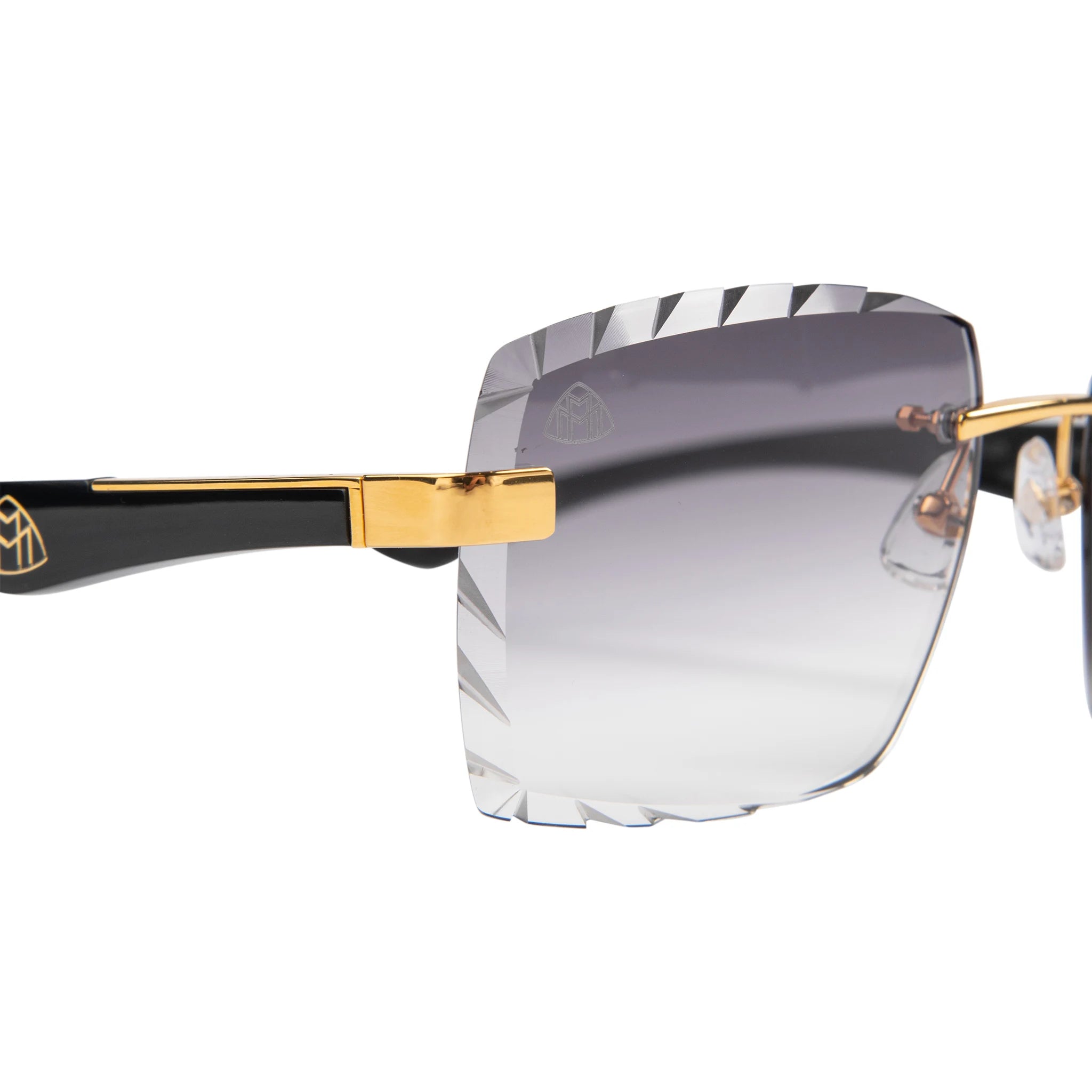 Lens detail view of Maybach Eyewear The Artist III P-WCW-Z25 Custom Black Grey Diamond Cut Sunglasses